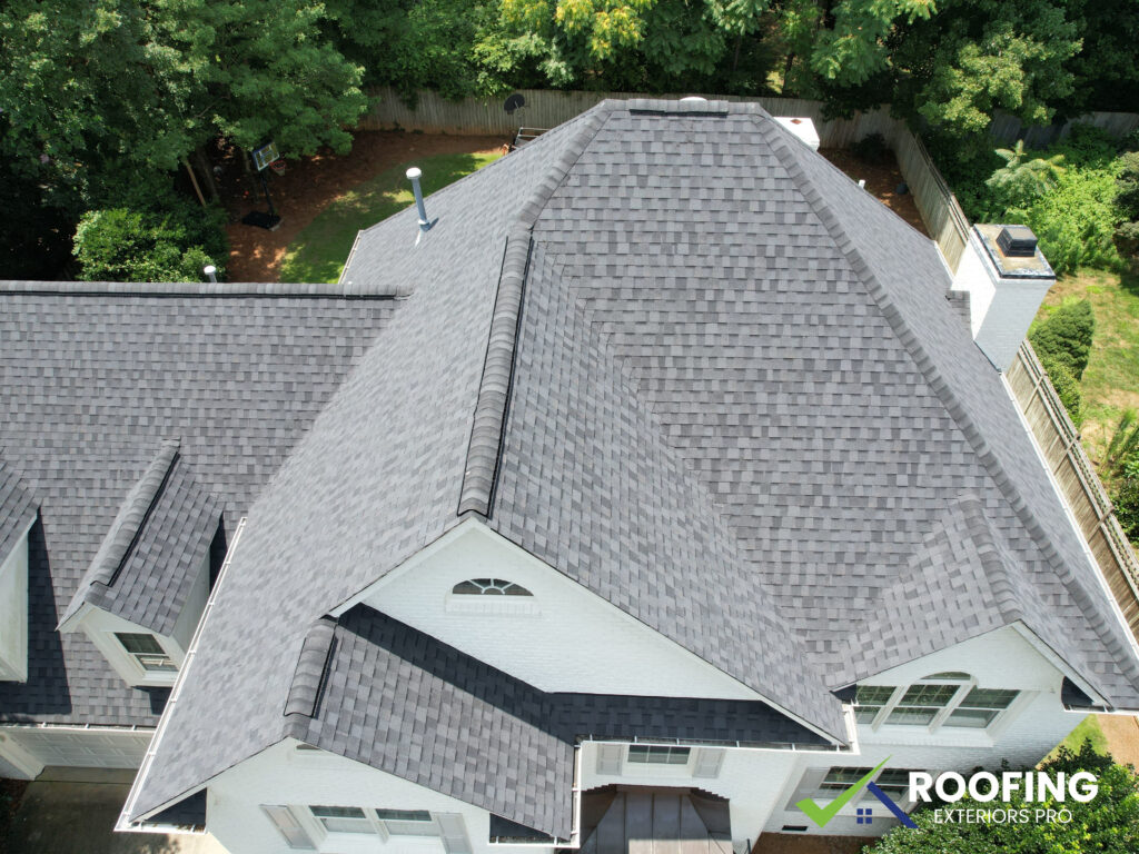 Roof inspection in Greensboro NC identifying storm damage before full roof replacement
