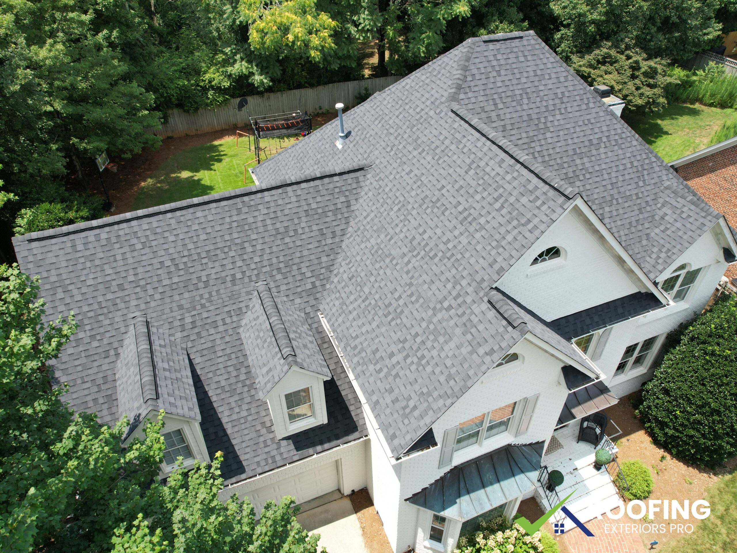 Close-up of CertainTeed shingles showing durability against hail and wind damage in Greensboro NC